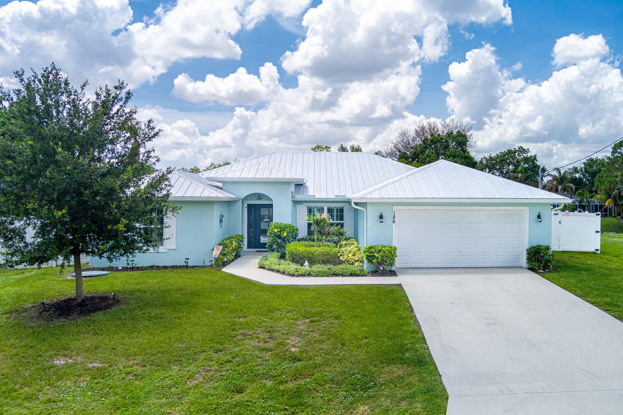 186 NE Dominican Terrace, FL 34983 — photo 2 of 52