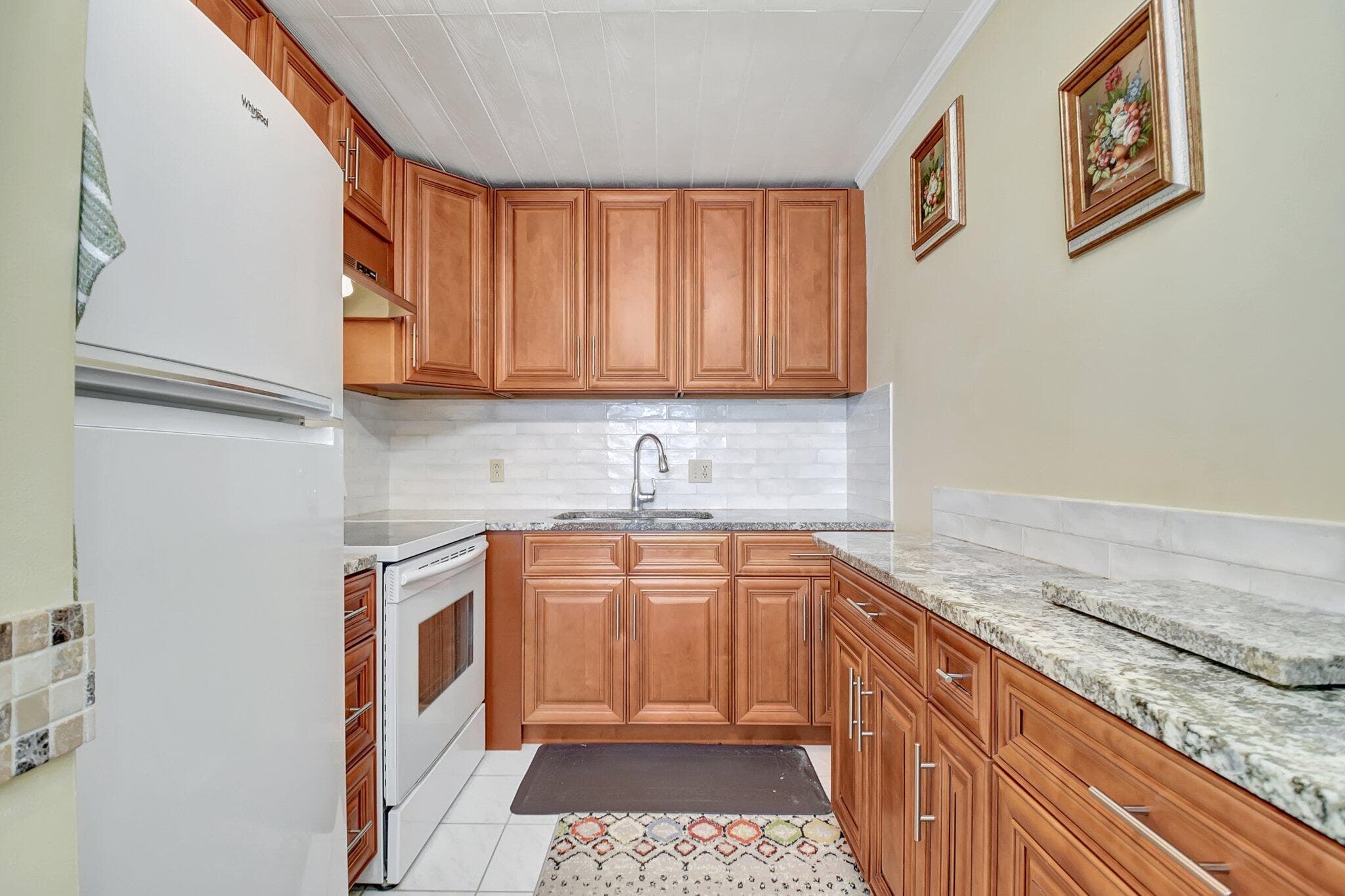 400 Village Green Circle W 212, Palm Springs, FL 33461 — photo 2 of 31
