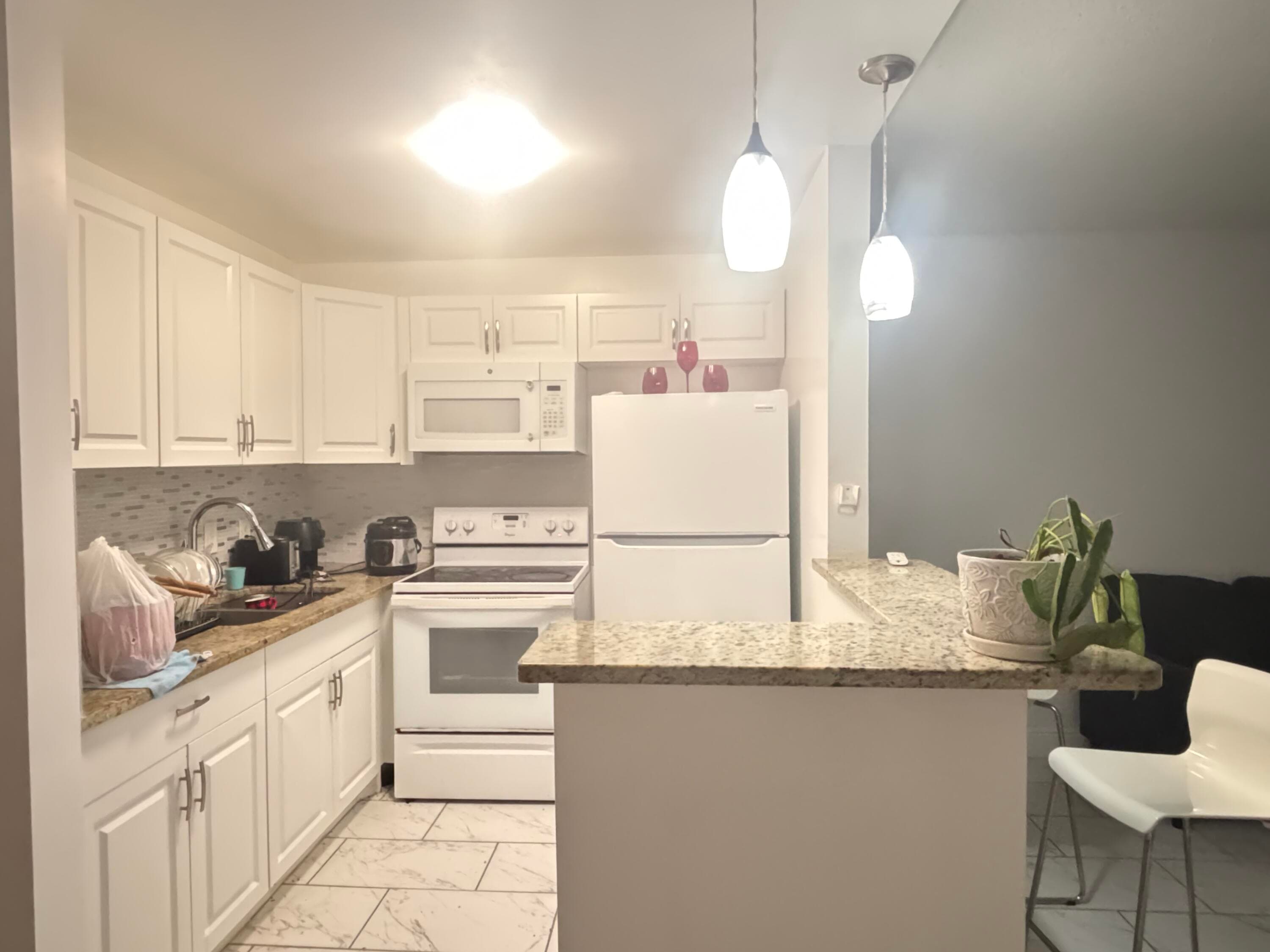 76 Cambridge D, West Palm Beach, FL 33417 — photo 2 of 15