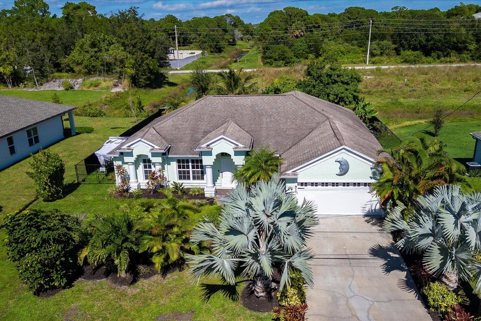 873 SW Tulip Boulevard, Port St. Lucie, FL 34953 — photo 1 of 49