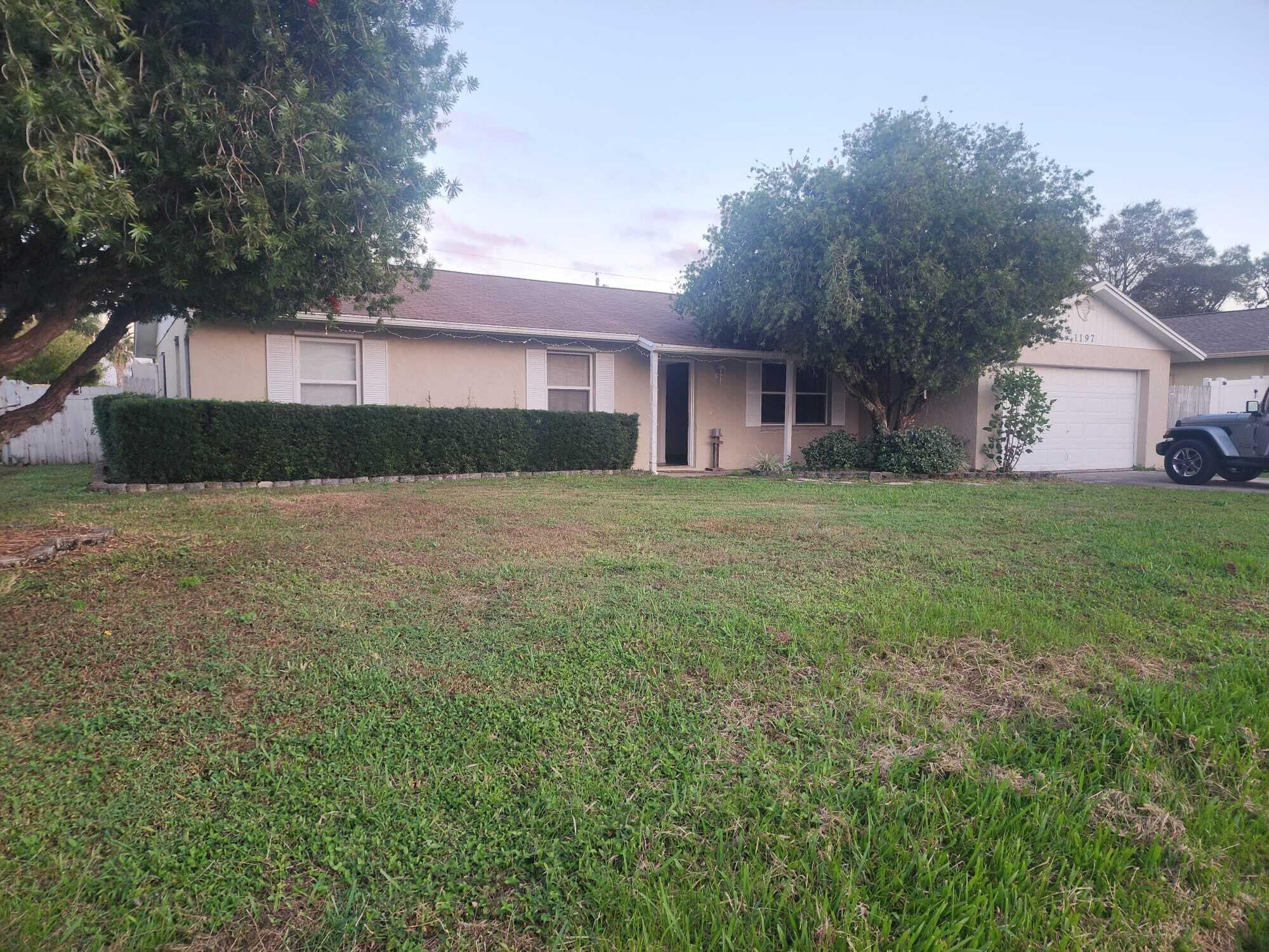 1197 SW Heather Street, Port St. Lucie, FL 34953 — photo 1 of 24