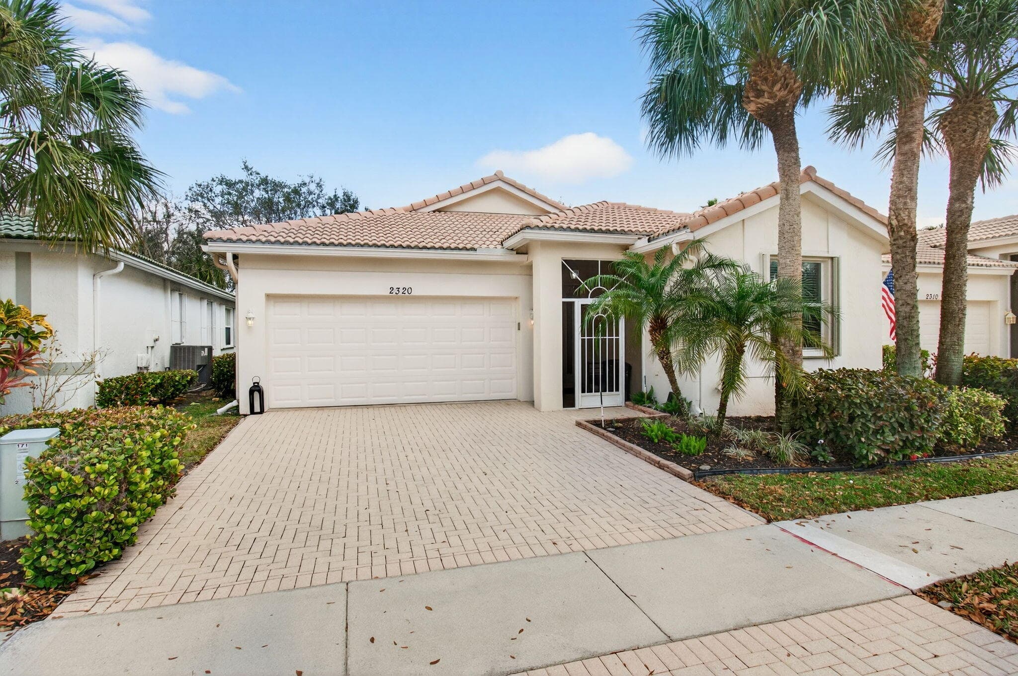 2320 Sapphire Circle, West Palm Beach, FL 33411 — photo 1 of 81