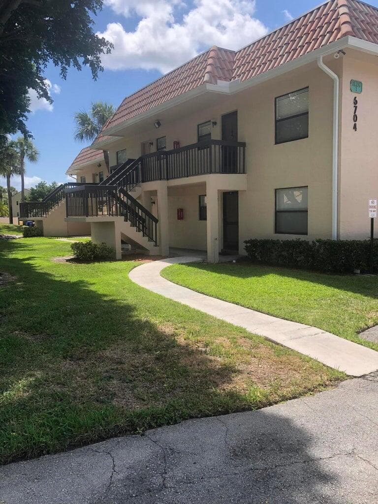 6704 Palmetto Circle S 203, Boca Raton, FL 33433 — photo 1 of 9