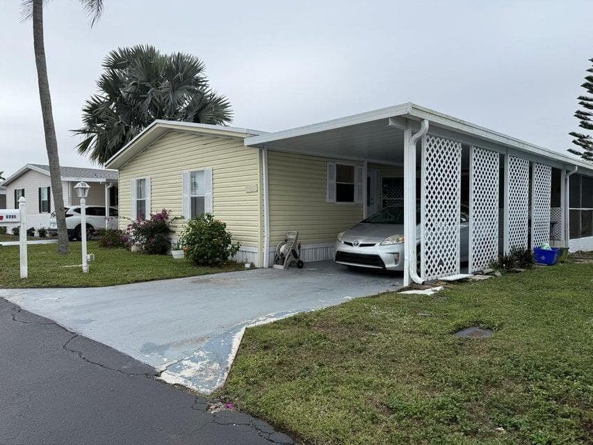 6085 Seashore Drive, Atlantis, FL 33462 — photo 1 of 20