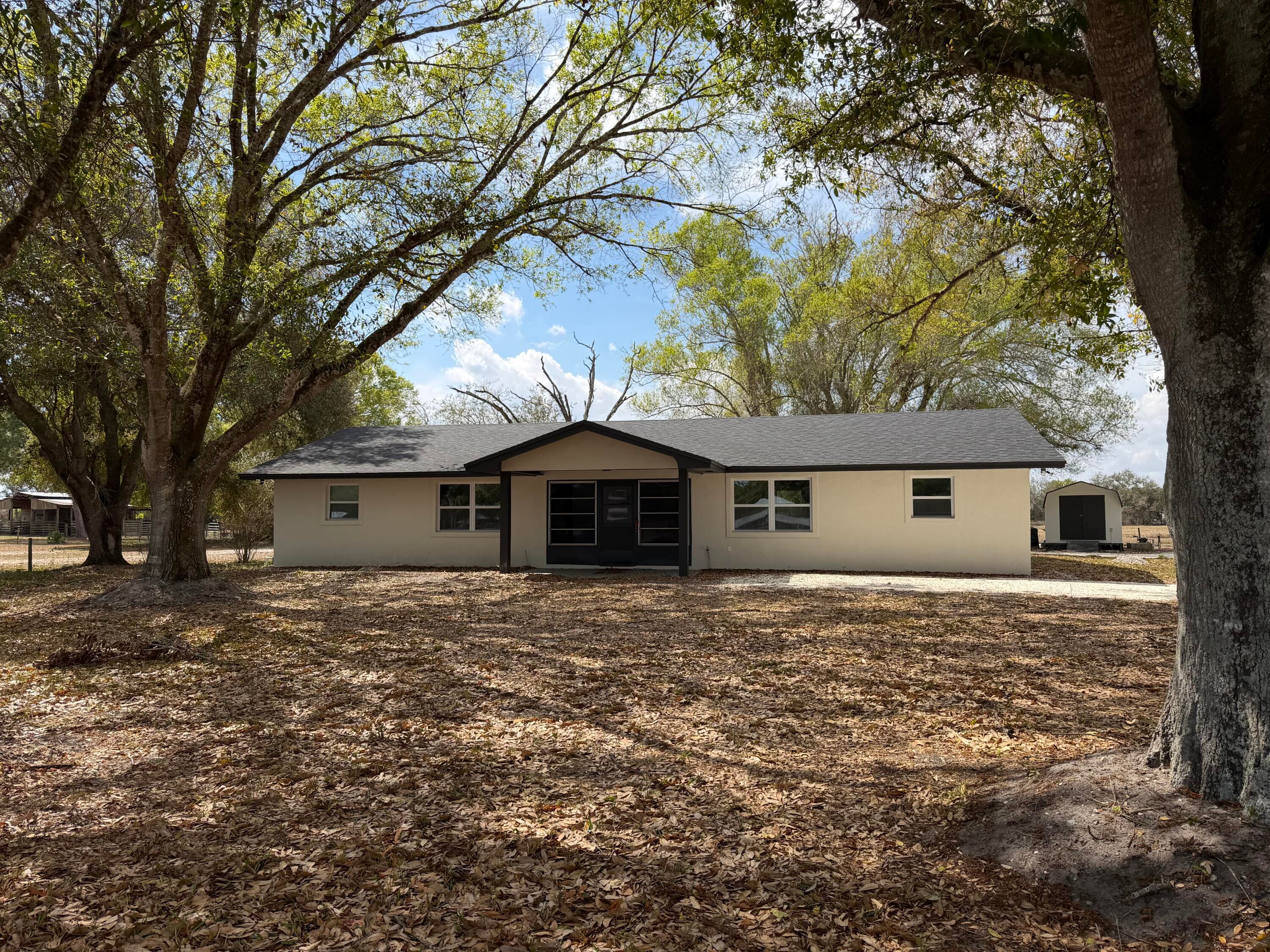 311 SW 67th Drive, Okeechobee, FL 34974 — photo 1 of 23