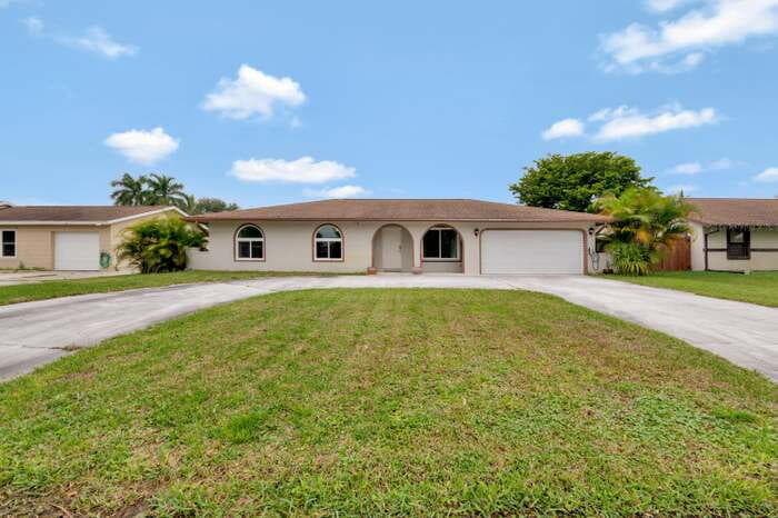 335 Sandpiper Avenue, Royal Palm Beach, FL 33411 — photo 1 of 3