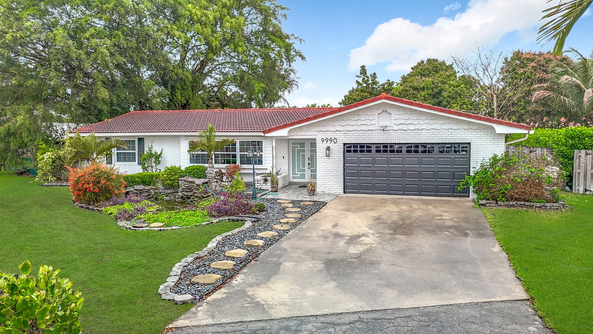 9990 NW 38th Street, Coral Springs, FL 33065 — photo 1 of 50