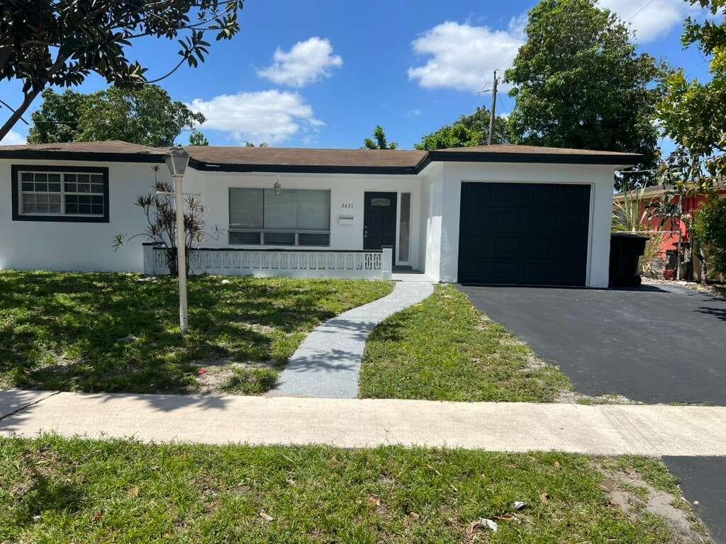 3631 NW 33rd Avenue, Lauderdale Lakes, FL 33309 — photo 1 of 28