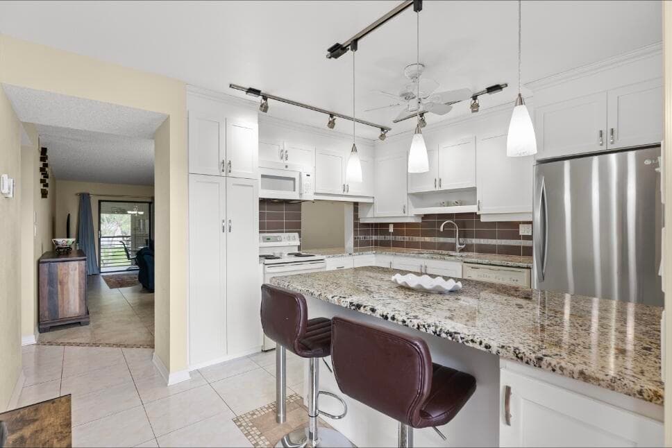 6095 N Sabal Palm Boulevard 210, Tamarac, FL 33319 — photo