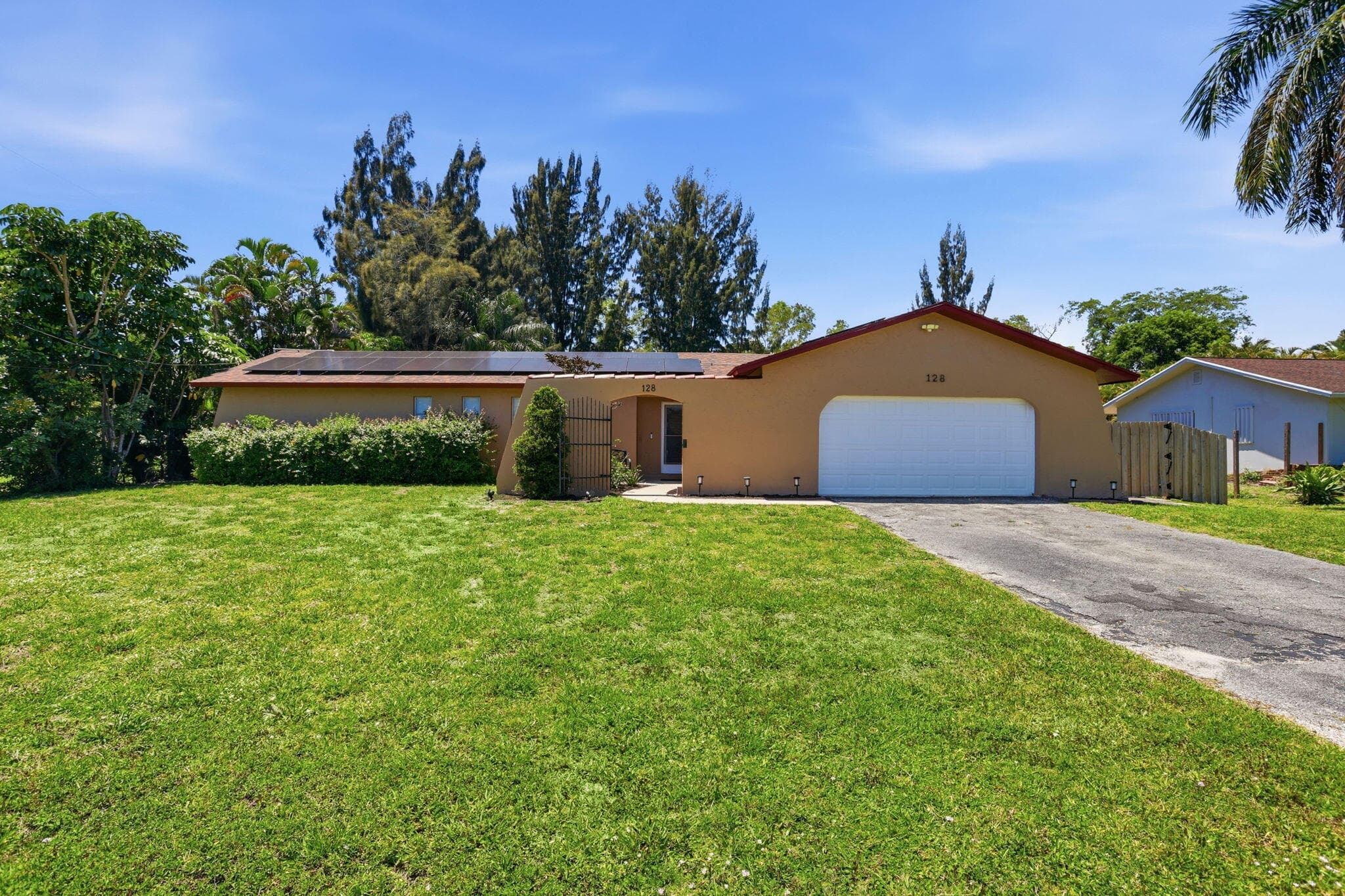 128 Barberton Road, Lake Worth, FL 33467 — photo 1 of 49