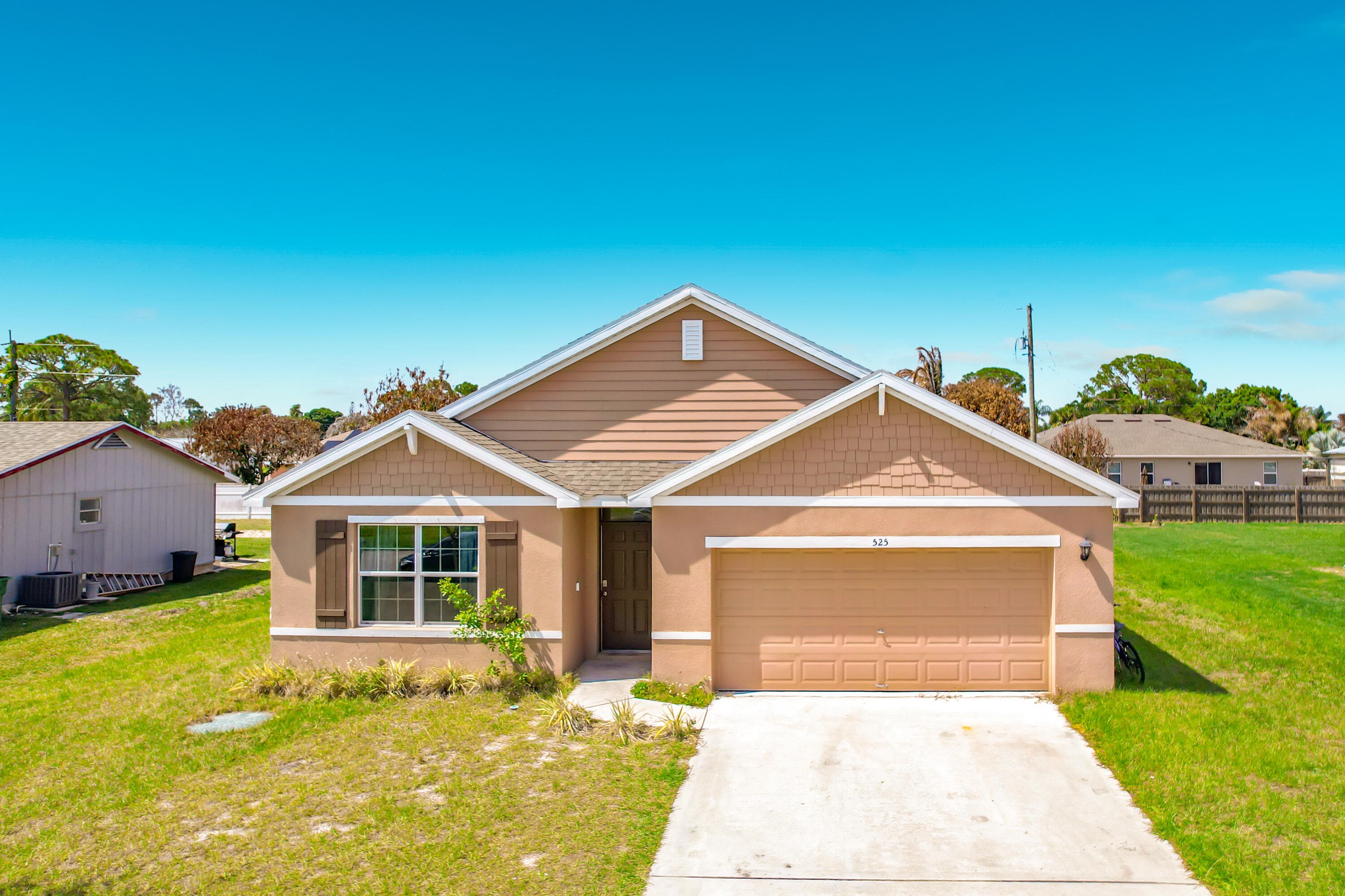 525 SW Twig Avenue, Port St. Lucie, FL 34983 — photo 1 of 47