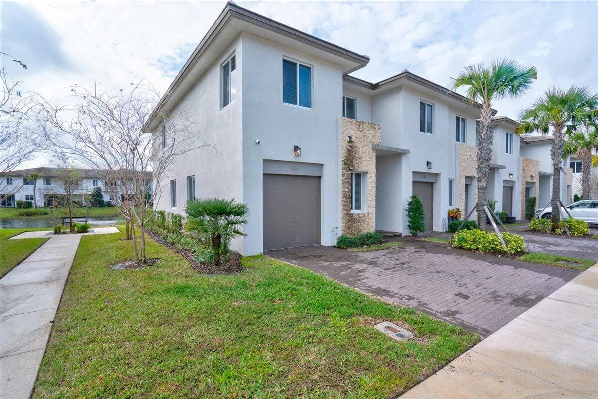 1451 Pioneer Way, Royal Palm Beach, FL 33411 — photo 1 of 66