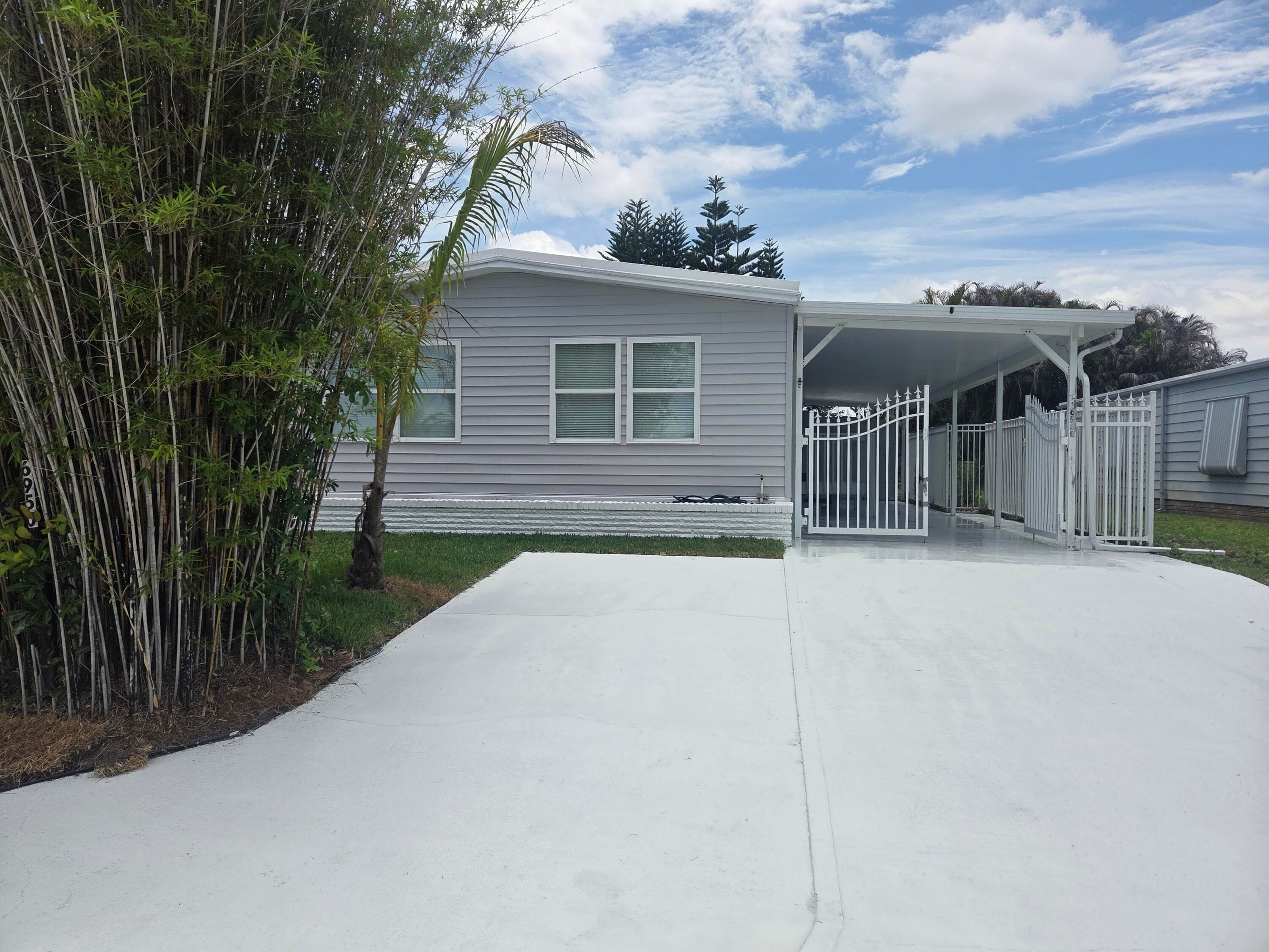 6950 SE Congress Street, Hobe Sound, FL 33455 — photo 1 of 18