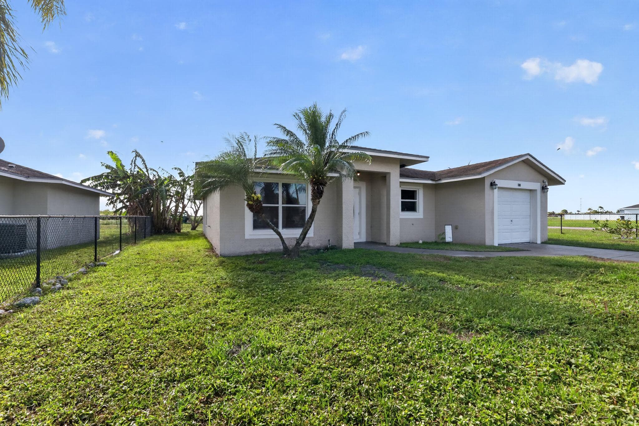 138 Dabou Loop, Belle Glade, FL 33430 — photo 3 of 29