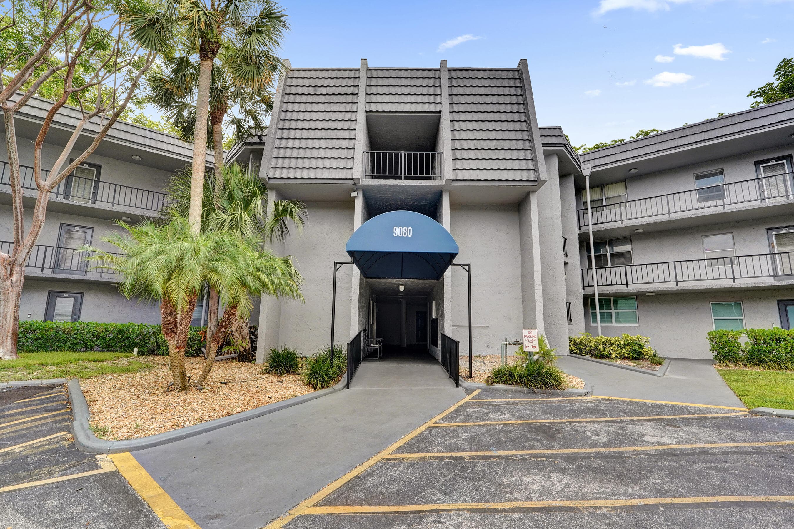 9080 Lime Bay Boulevard 104, Tamarac, FL 33321 — photo 1 of 26