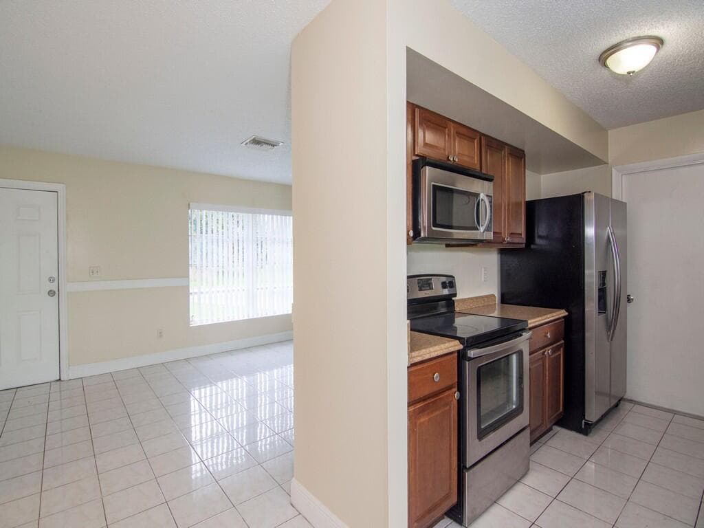 650 SE Evergreen Terrace, FL 34983 — photo 16 of 44