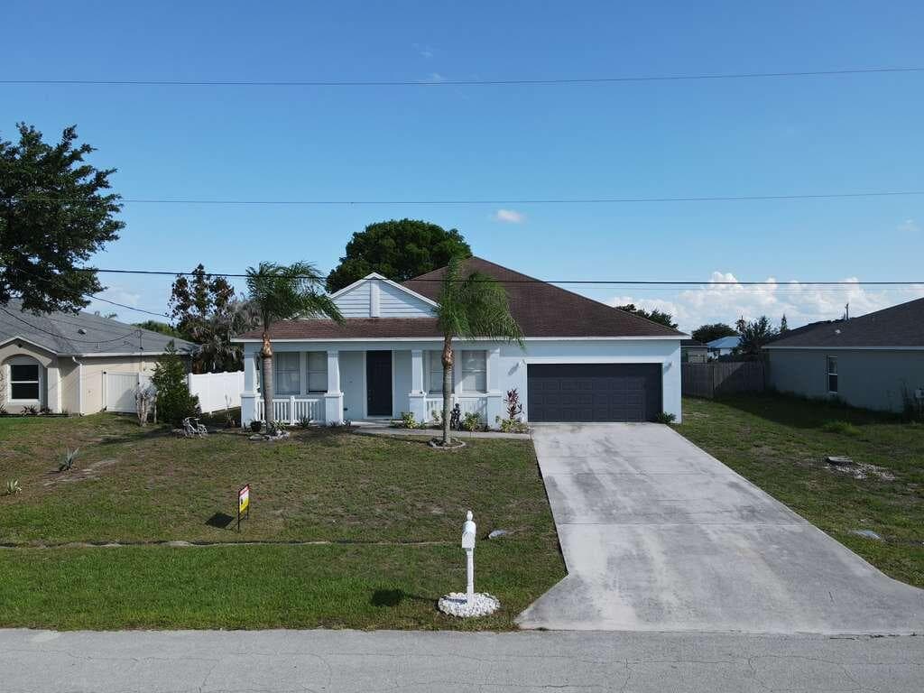 948 SW Jeremko Avenue, Port St. Lucie, FL 34953 — photo 4 of 23