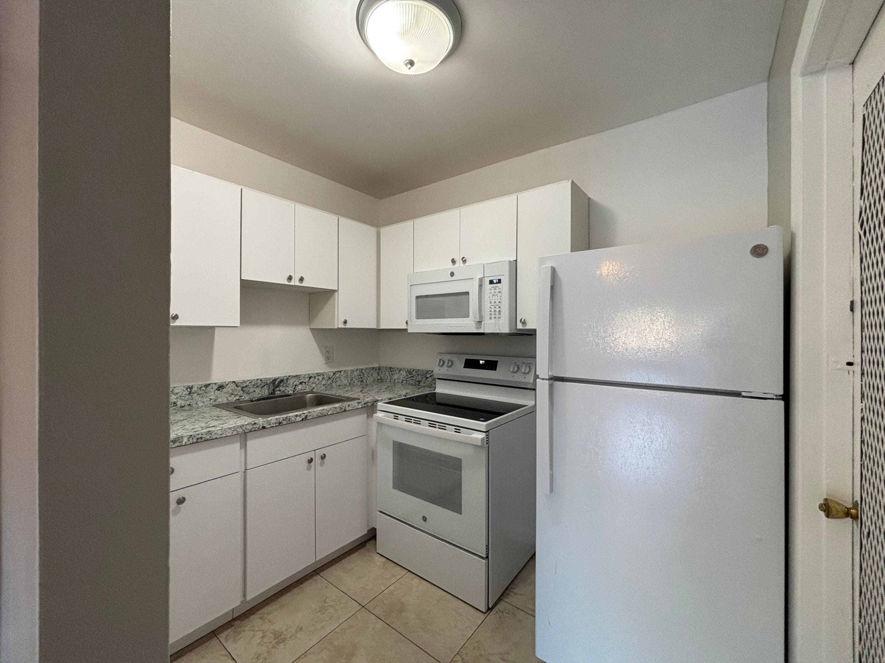 491 NW 42nd Avenue 4, Plantation, FL 33317 — photo 1 of 20
