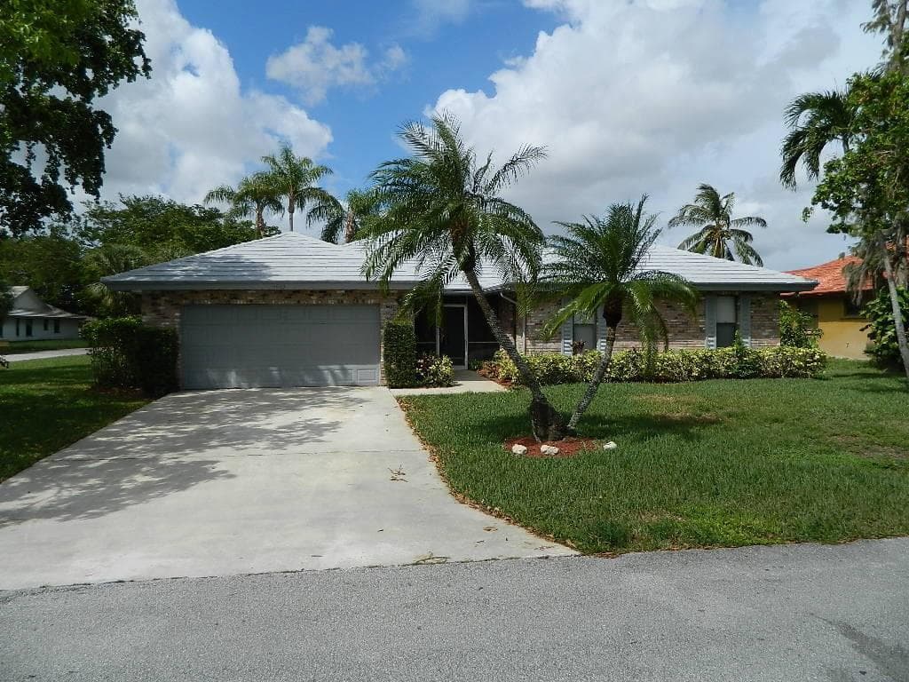 4002 NW 73rd Avenue, Coral Springs, FL 33065 — photo 1 of 13
