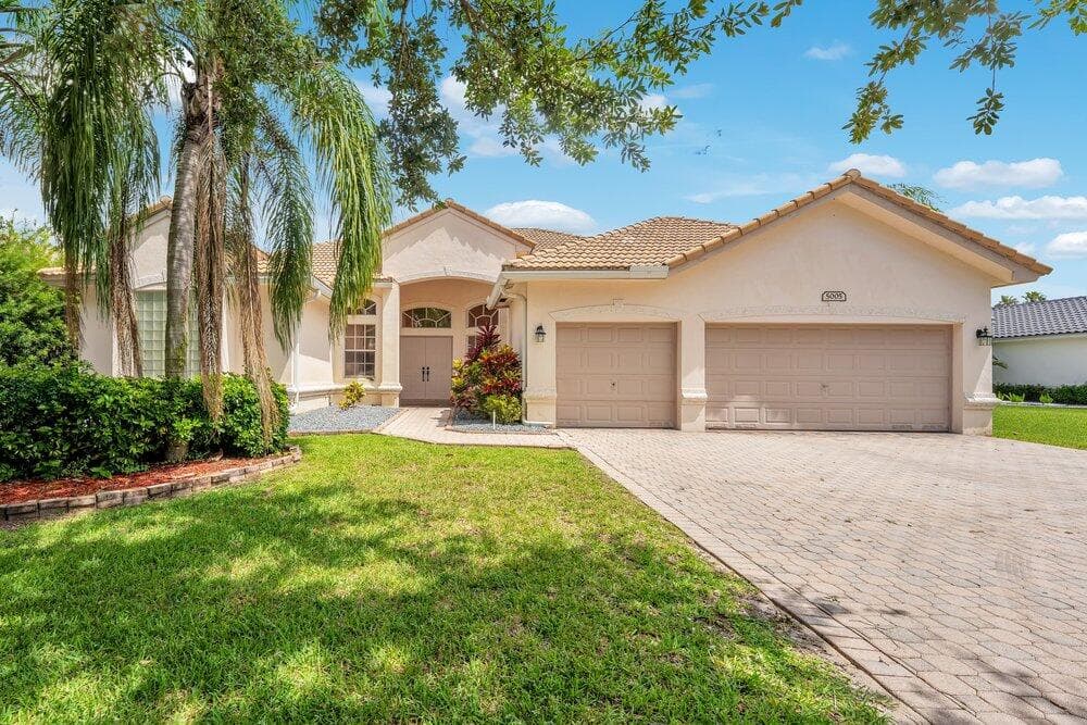 5005 NW 57th Terrace, Coral Springs, FL 33067 — photo 1 of 34