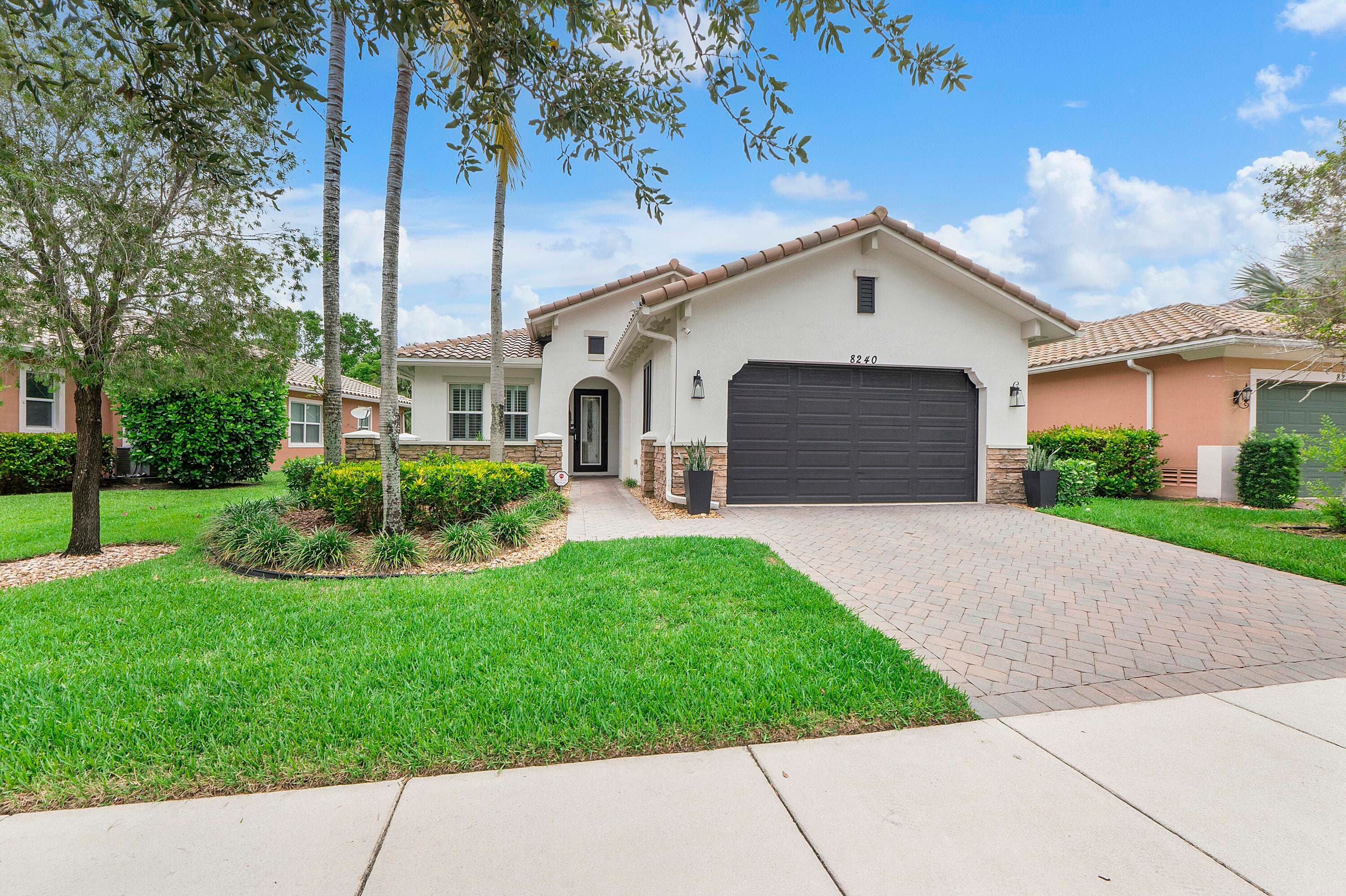 8240 NW 120th Way, Parkland, FL 33076 — photo 1 of 57