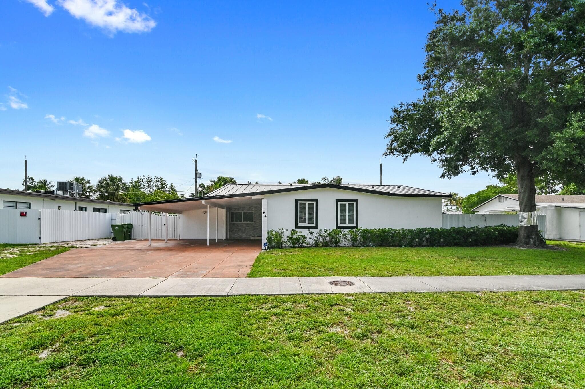 124 Davis Road, Palm Springs, FL 33461 — photo 1 of 44
